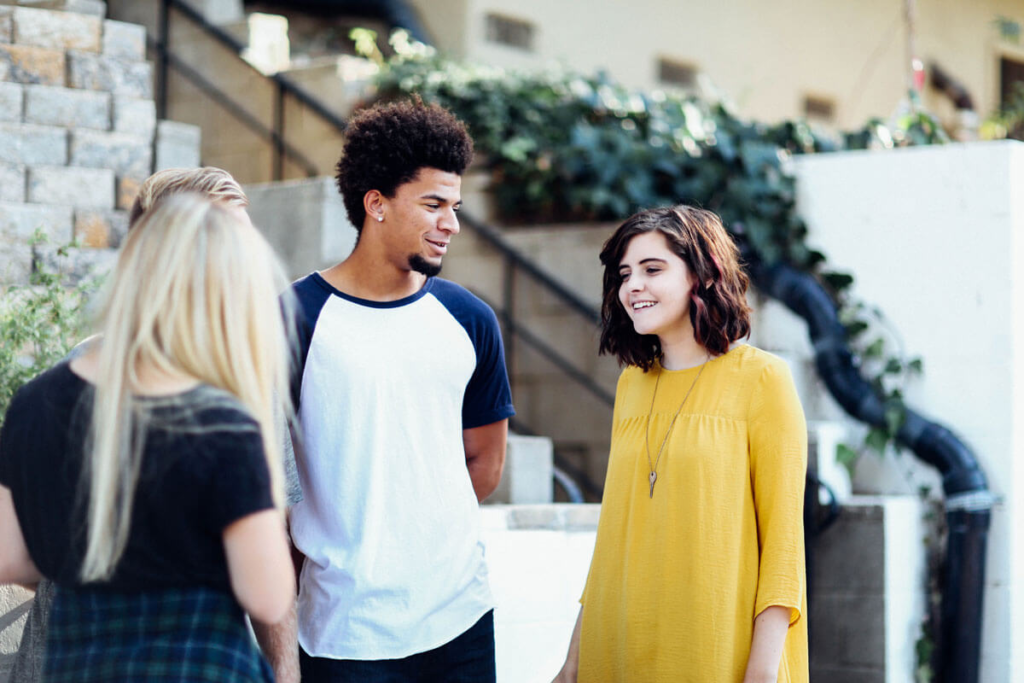 Three people talking